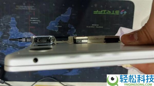 辣眼睛,为省固态钱MacBook Air“漂亮”改装:胶带硬粘外挂SATA硬盘